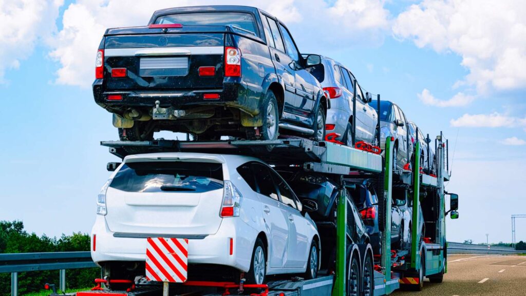 Car carrier truck in road or highway