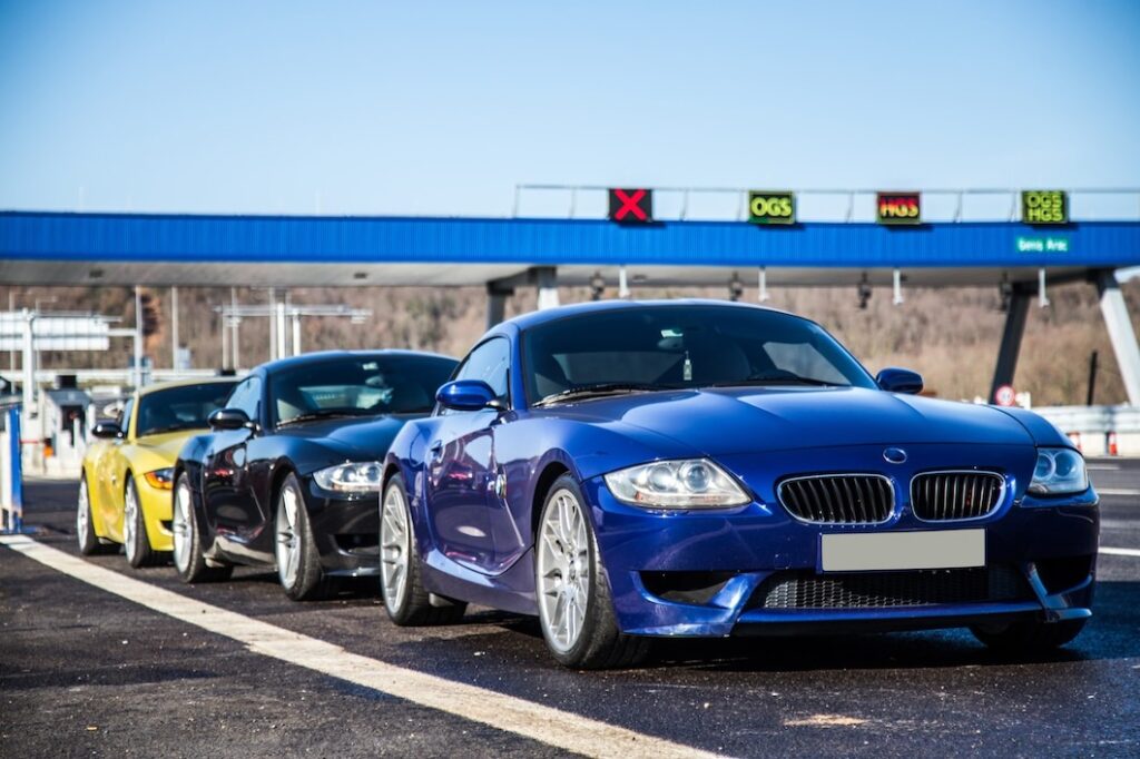 luxury sedan sport cars on the road.