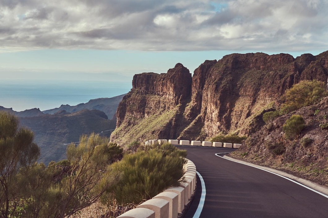 twisting and winding roads going up the mountains